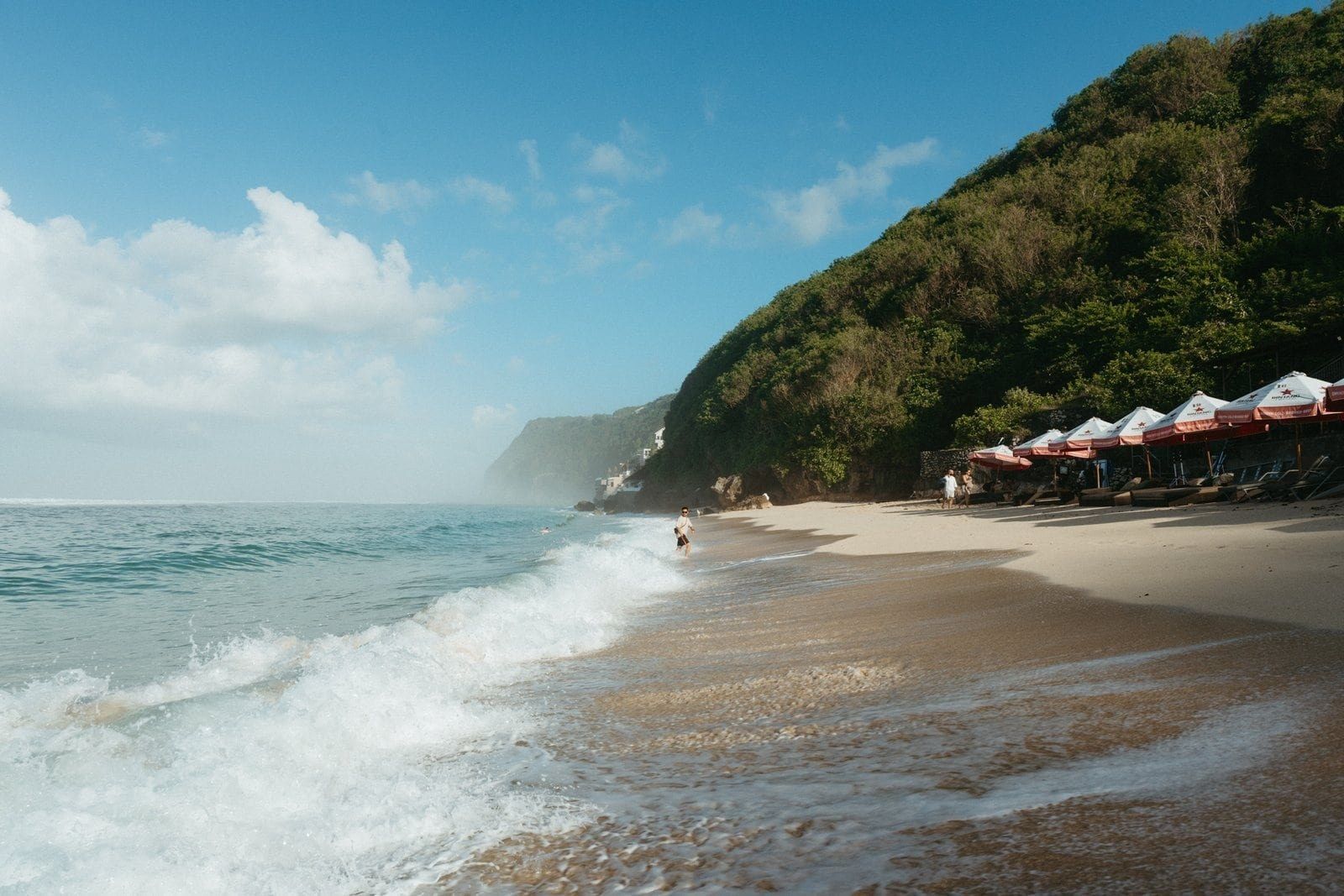 A surf beach below the Bukit, the headland beyond.