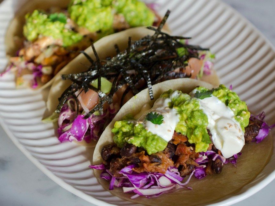 Plated small plates at Gooseberry, set among the trees.