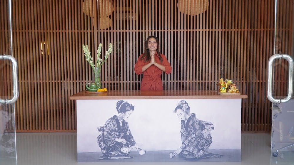 The reception at Shiki Spa in the resort — timber screens, a paper-lantern ceiling and a calm welcome.